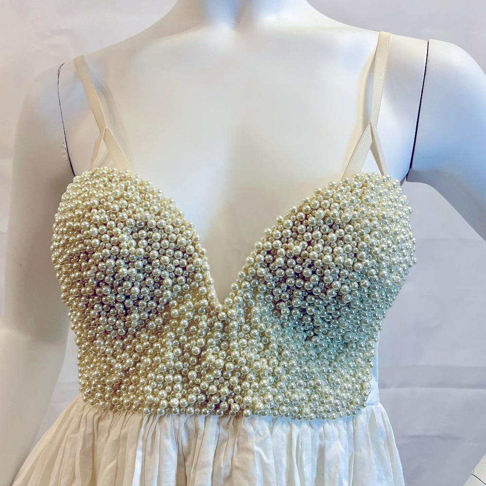 Amazing women off white bustier-tunic top with beaded bra style. Size 4-5.